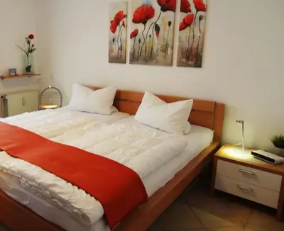 Ein Bett oder Betten in einem Zimmer der Unterkunft Residenz Passat Cuxhaven 5