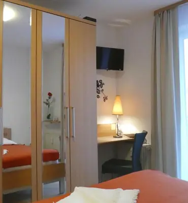 Ein Bett oder Betten in einem Zimmer der Unterkunft Residenz Passat Cuxhaven 5