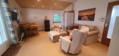 Ein Sitzbereich in der Unterkunft Ferienhaus Frische Brise direkt am Nordsee Deich