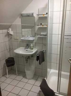 Ein Badezimmer in der Unterkunft Dithmarscher Haus