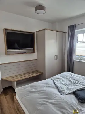 Ein Bett oder Betten in einem Zimmer der Unterkunft Kleine Hafenperle Büsum