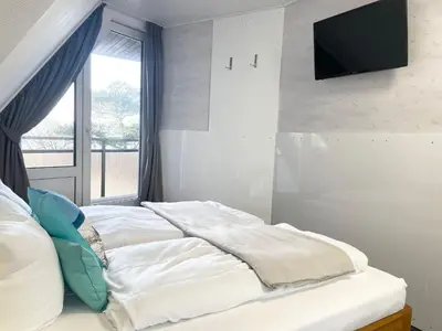 Ein Bett oder Betten in einem Zimmer der Unterkunft Meeresbrandung 37