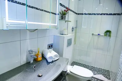 Ein Badezimmer in der Unterkunft Strandhochhaus SB11