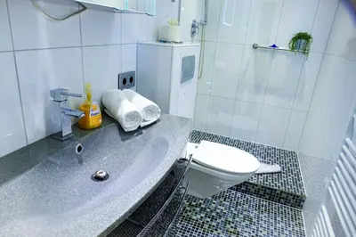 Ein Badezimmer in der Unterkunft Strandhochhaus SB11
