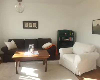 Ein Sitzbereich in der Unterkunft Ferienwohnung Medemgarten