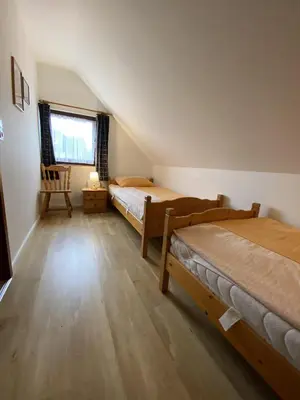 Ein Bett oder Betten in einem Zimmer der Unterkunft Hus Waterkant