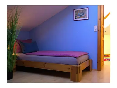 Ein Bett oder Betten in einem Zimmer der Unterkunft „Achtkanthus Achtern Diek“