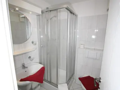 Ein Badezimmer in der Unterkunft Residenz Dünenweg
