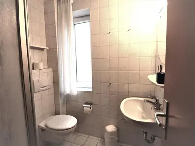 Ein Badezimmer in der Unterkunft Residenz Haus am Mühlenpark
