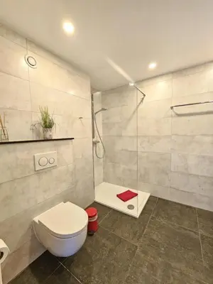 Ein Badezimmer in der Unterkunft Meerblick 424