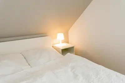 Ein Bett oder Betten in einem Zimmer der Unterkunft Strandperle Alexander