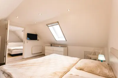 Ein Bett oder Betten in einem Zimmer der Unterkunft Strandbrise