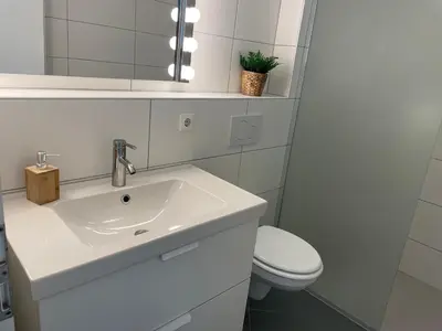 Ein Badezimmer in der Unterkunft Nordseebrandung A1 5