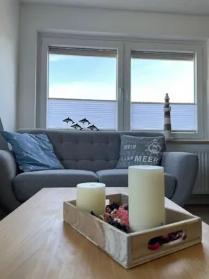 Ein Sitzbereich in der Unterkunft Ferienwohnung Deichlicht