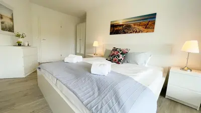 Ein Bett oder Betten in einem Zimmer der Unterkunft Nordseebrandung A2 3