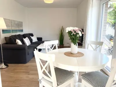 Ein Sitzbereich in der Unterkunft Duhner Strand Whg 1