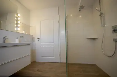 Ein Badezimmer in der Unterkunft Duhner Strand Whg 1