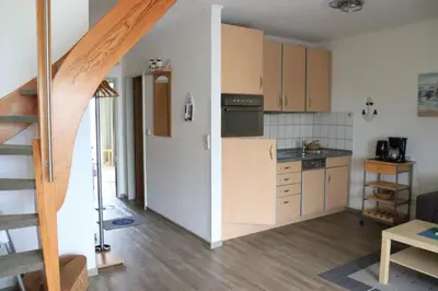 Küche/Küchenzeile in der Unterkunft Ferienwohnung mit Seeblick und Schwimmbadnutzung in Cuxhaven