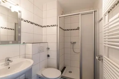 Ein Badezimmer in der Unterkunft Haus Vogelsand, App 309