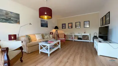 Ein Sitzbereich in der Unterkunft Ferienhaus James