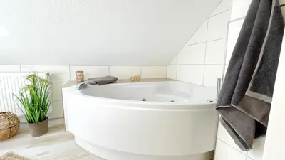 Ein Badezimmer in der Unterkunft Kapitänshaus FeWo 4