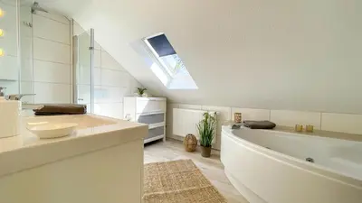 Ein Badezimmer in der Unterkunft Kapitänshaus FeWo 4