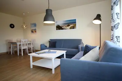Ein Sitzbereich in der Unterkunft Kurpark-Residenz 108