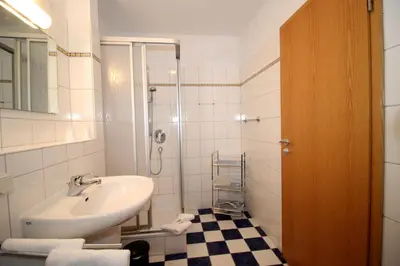Ein Badezimmer in der Unterkunft Kurpark-Residenz 110