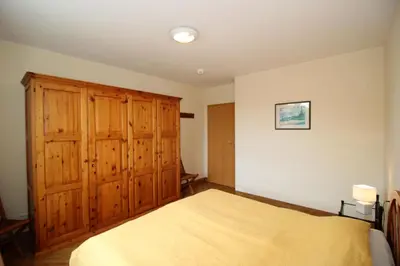 Ein Bett oder Betten in einem Zimmer der Unterkunft Kurpark-Residenz 110
