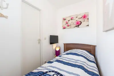 Ein Bett oder Betten in einem Zimmer der Unterkunft Lord Nelson 715