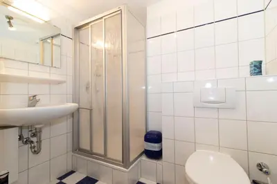 Ein Badezimmer in der Unterkunft Kurpark-Residenz 142