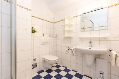 Ein Badezimmer in der Unterkunft Kurpark-Residenz 125