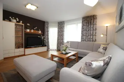 Ein Sitzbereich in der Unterkunft Kurpark-Residenz 132