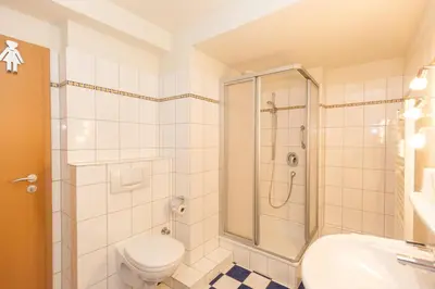 Ein Badezimmer in der Unterkunft Kurpark-Residenz 215