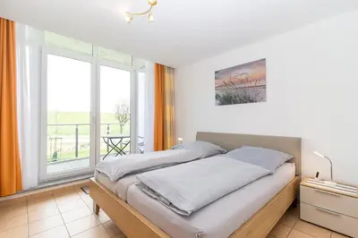 Ein Sitzbereich in der Unterkunft Nordseeblick 5