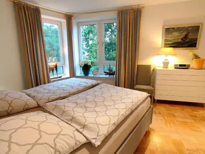 Ein Bett oder Betten in einem Zimmer der Unterkunft Seeterrassen 10