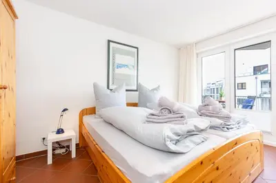 Ein Bett oder Betten in einem Zimmer der Unterkunft Marina 28-1