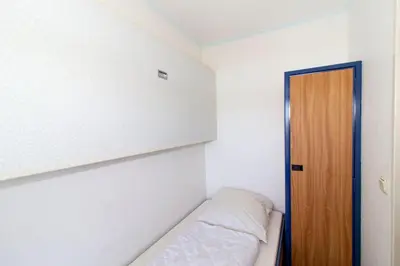 Ein Bett oder Betten in einem Zimmer der Unterkunft Lord Nelson 203