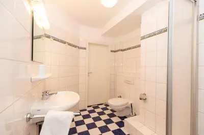 Ein Badezimmer in der Unterkunft Kurpark-Residenz 242