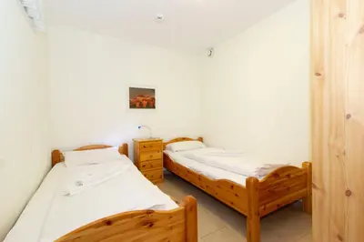 Ein Bett oder Betten in einem Zimmer der Unterkunft Kurpark-Residenz 208
