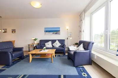 Ein Sitzbereich in der Unterkunft Kurpark-Residenz 208