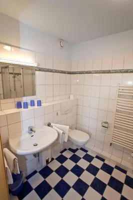 Ein Badezimmer in der Unterkunft Kurpark-Residenz 201