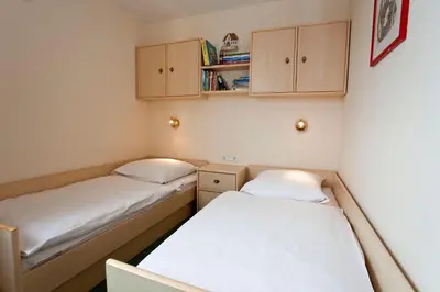 Ein Bett oder Betten in einem Zimmer der Unterkunft Kurpark-Residenz 201