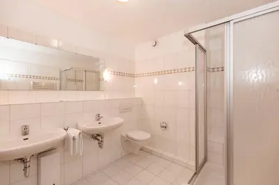 Ein Badezimmer in der Unterkunft Kurpark-Residenz 207