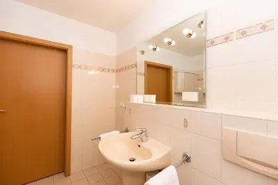 Ein Badezimmer in der Unterkunft Kurpark-Residenz 234