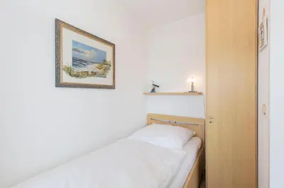 Ein Bett oder Betten in einem Zimmer der Unterkunft Lord Nelson 705