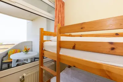 Ein Bett oder Betten in einem Zimmer der Unterkunft Lord Nelson 703