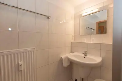 Ein Badezimmer in der Unterkunft Kurpark-Residenz 218A