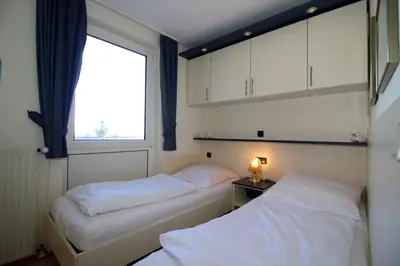 Ein Bett oder Betten in einem Zimmer der Unterkunft Lord Nelson 819