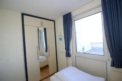 Ein Bett oder Betten in einem Zimmer der Unterkunft Lord Nelson 819